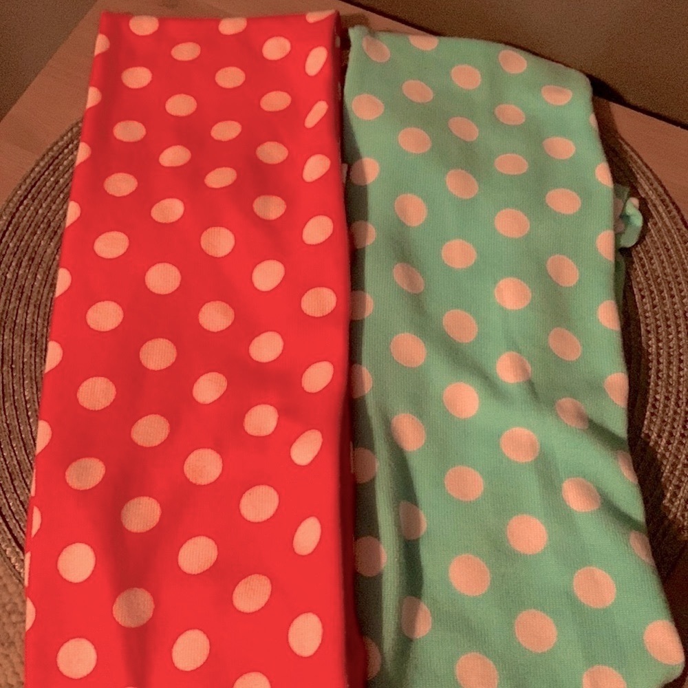 Two loop polka-dot scarfs, pink and light teal. Very cute!  Super soft!
